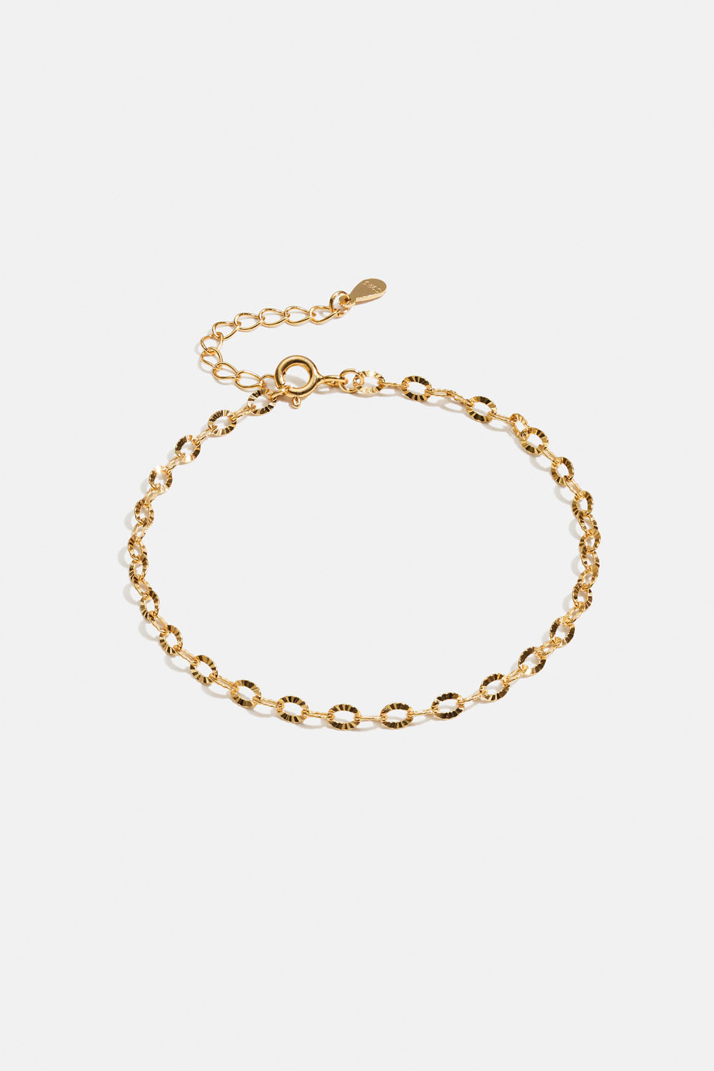 Aito 18k kullattu hopearannekoru, jossa rosoinen ketju