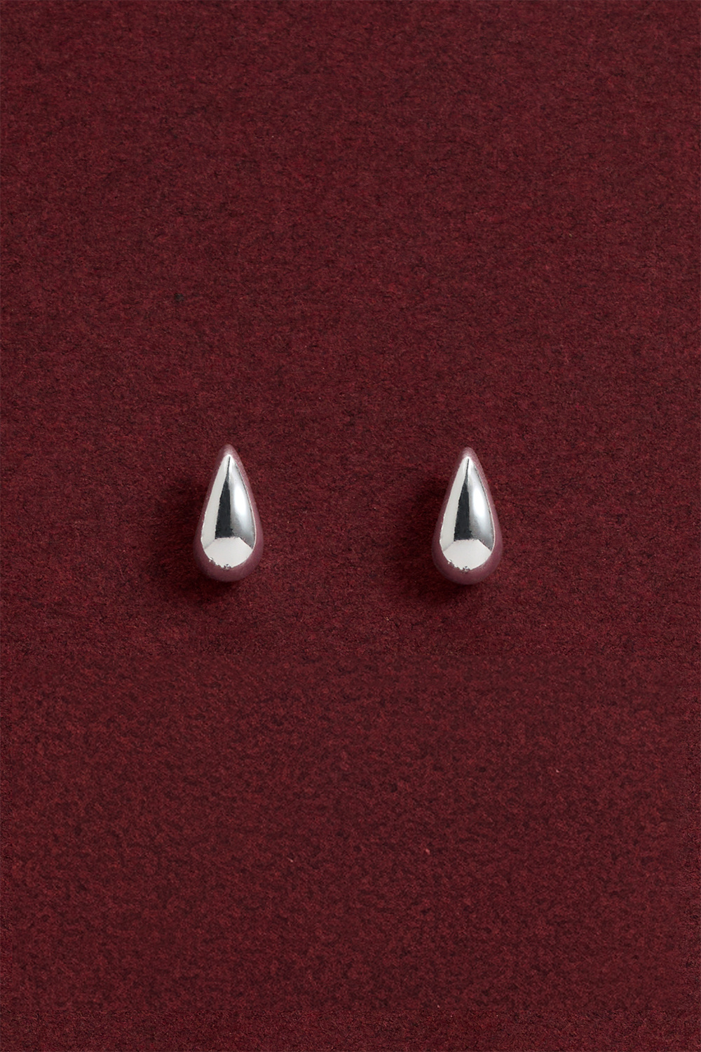 Pisaran muotoiset korvarenkaat aidosta hopeasta