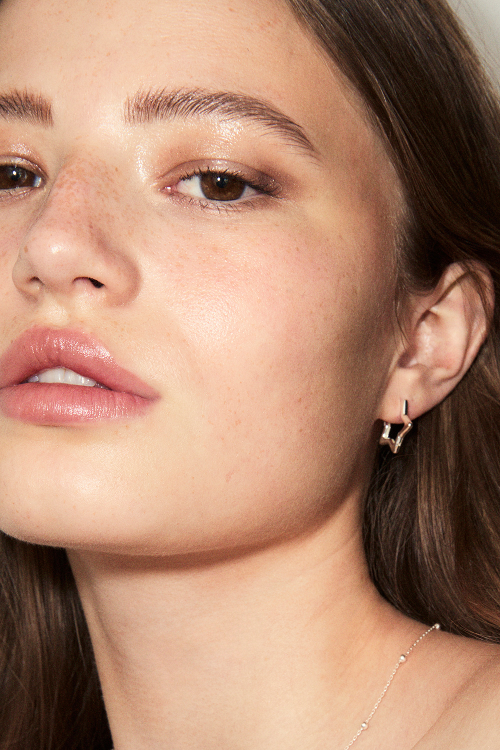 Tähdenmuotoiset korvarenkaat aitoa hopeaa