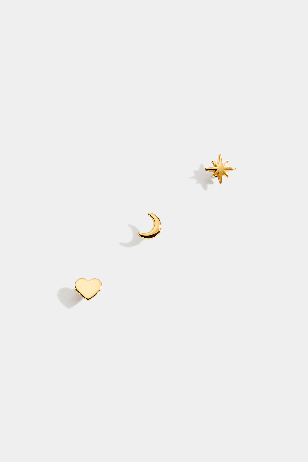 Mini nappikorvakorut 18k kullattua hopeaa, tähti, kuu, sydän
