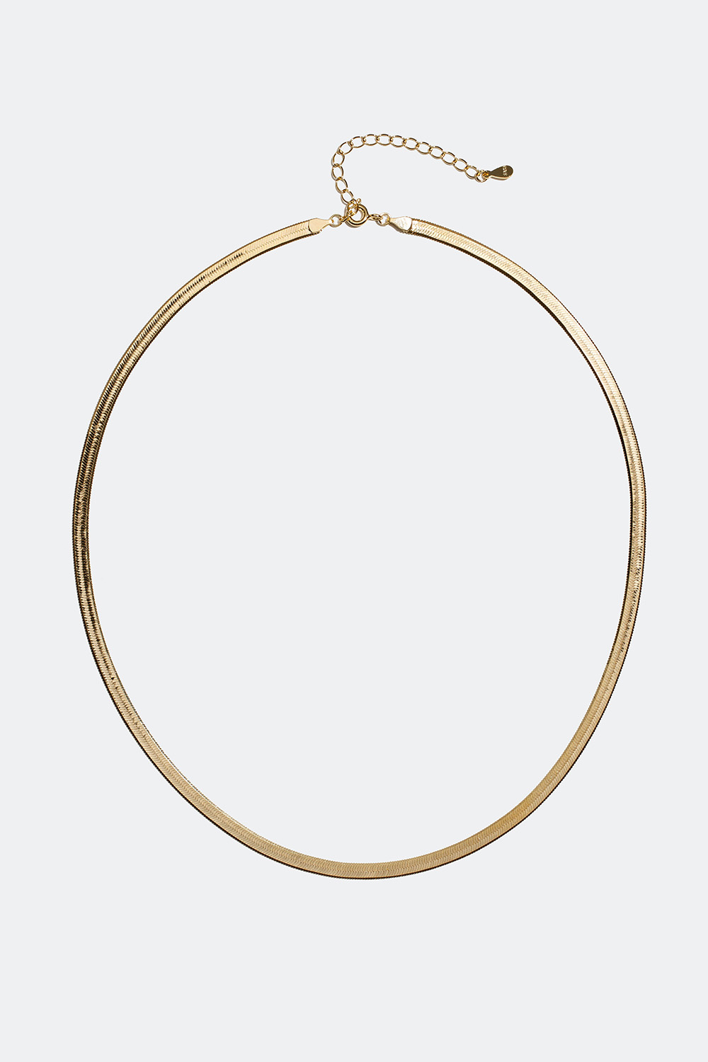 Litteä kaulaketju, jossa 18 karaatin kultaus
