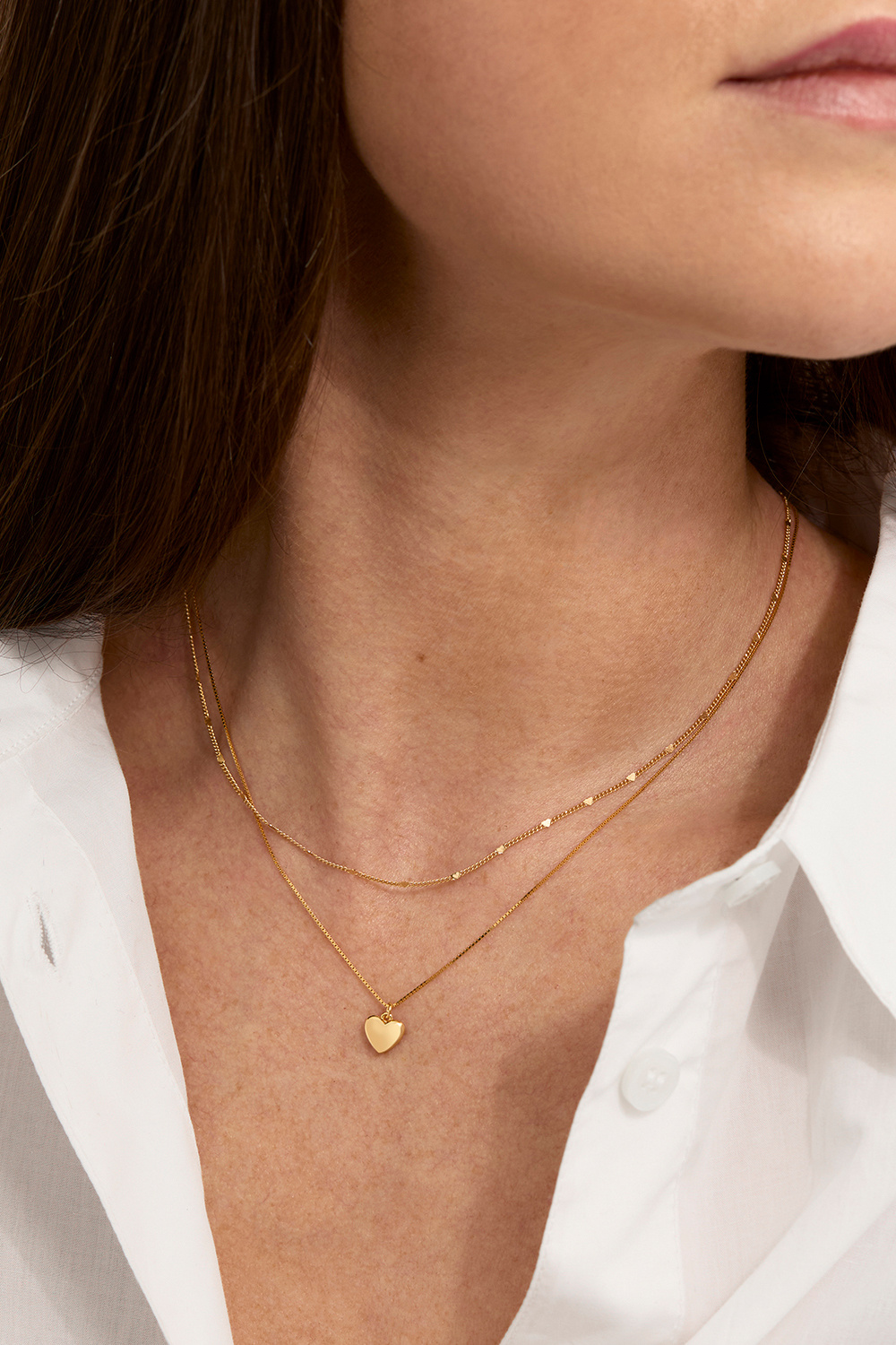 Aito 18k kullattu hopeakaulakoru, jossa pieni sydän