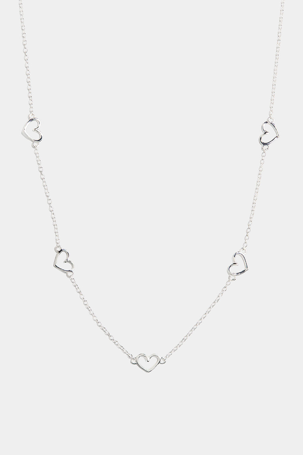 Aito hopeakaulakoru, jossa viisi sydäntä