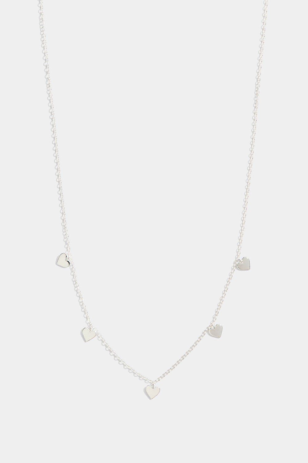 Hopeakaulakoru, jossa sydänriipus