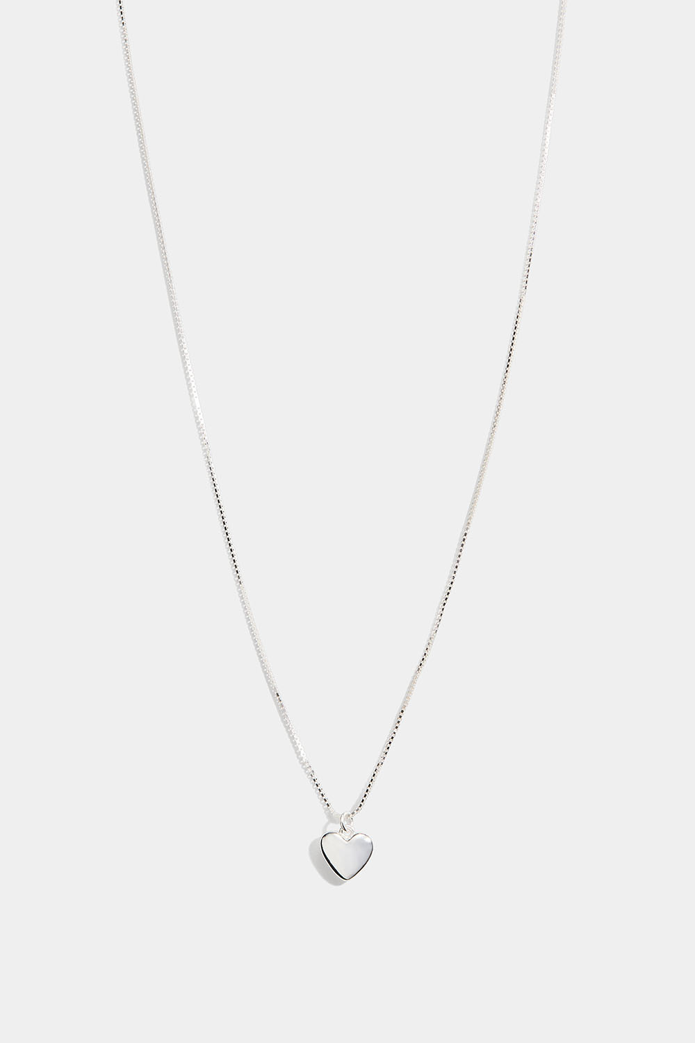 Aito hopeakaulakoru, jossa sydän