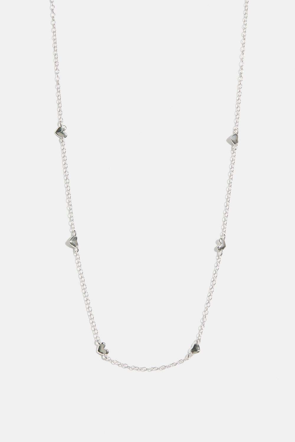 Aito hopeakaulakoru, jossa pieniä sydämiä