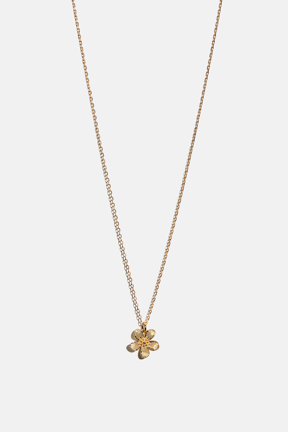 Aito 18k kullattu hopeakaulakoru, jossa teksturoitu kukka